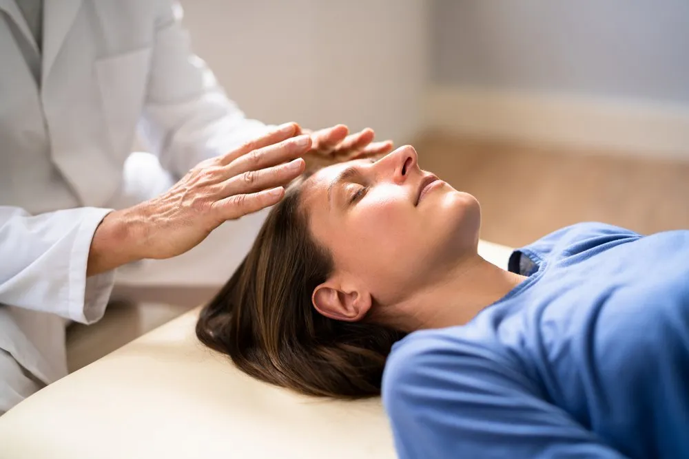 Woman receiving anti-ageing facial treatment from a professional at a beauty clinic, promoting youthful skin and rejuvenation in Bankstown.